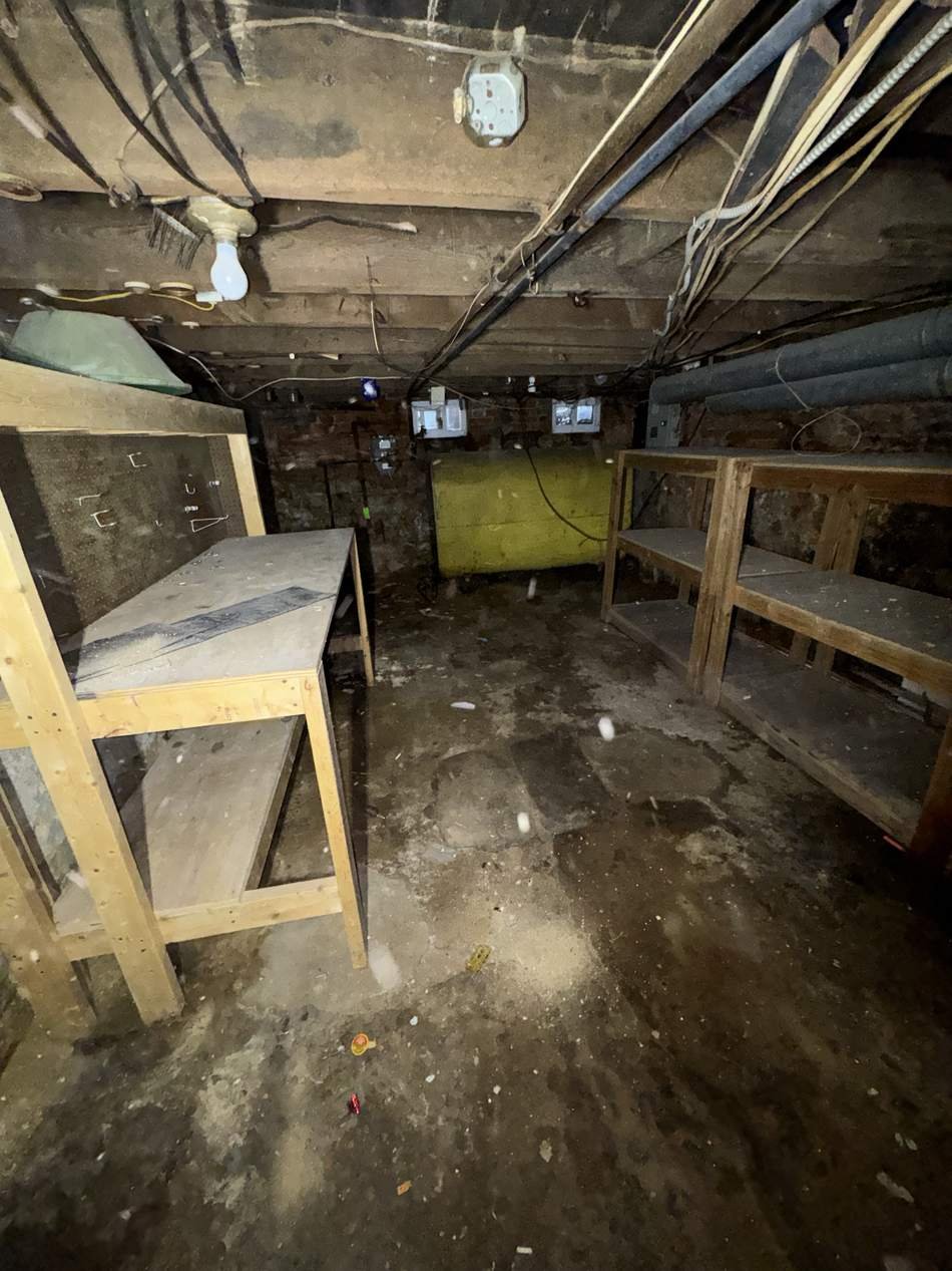 Basement cleared out and swept clean after a junk removal job